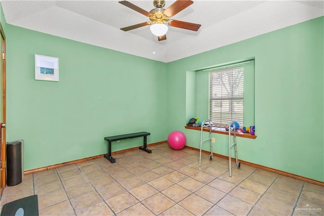 interior space with ceiling fan and light tile patterned floors