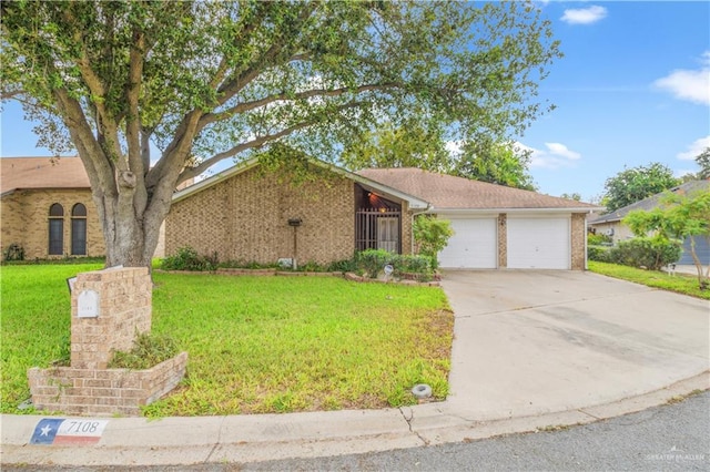 ranch-style house with a front yard and a garage