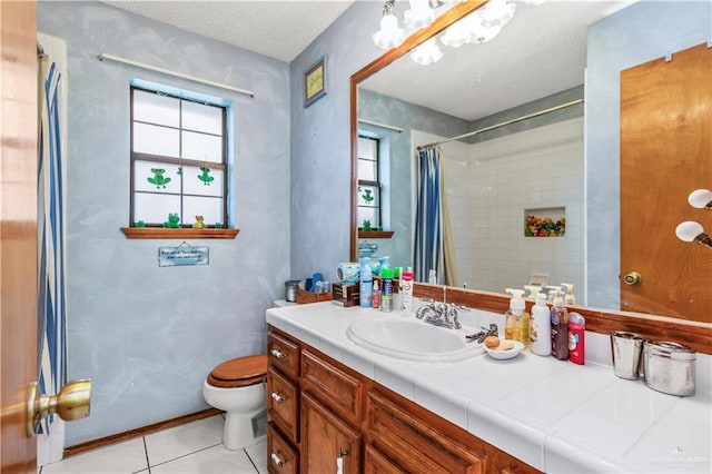 bathroom featuring a shower with curtain, tile patterned flooring, a textured ceiling, toilet, and vanity