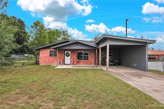 117 W Hawk Ave, Pharr, TX 78577 - ranch-style house with a carport, concrete driveway, and brick siding