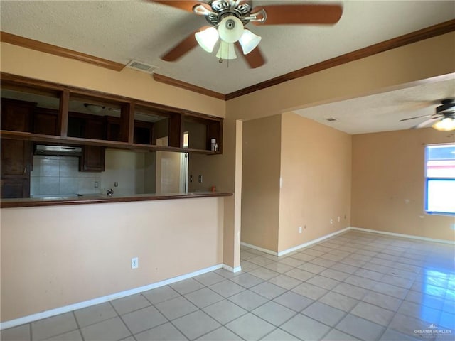 3823 Seles Dr, Weslaco, TX 78599 - interior space with light tile patterned flooring, ceiling fan, and crown molding