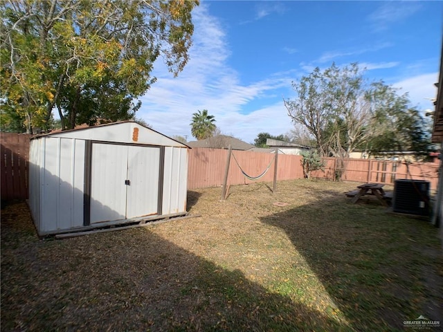 3823 Seles Dr, Weslaco, TX 78599 - view of yard with a storage shed and central AC unit