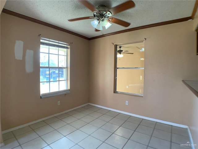 3823 Seles Dr, Weslaco, TX 78599 - tiled spare room featuring ornamental molding and a textured ceiling