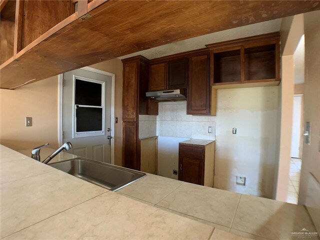 3823 Seles Dr, Weslaco, TX 78599 - kitchen featuring tasteful backsplash and sink