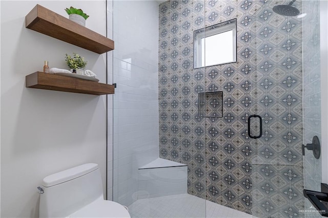 bathroom with walk in shower and toilet