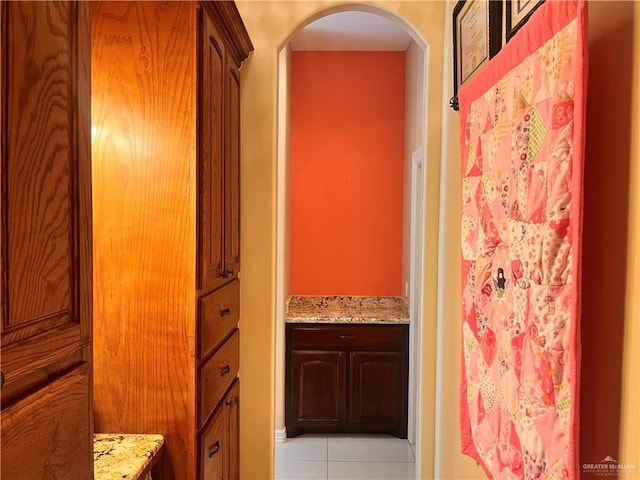 917 Beddoes Rd, La Feria, TX 78559 - corridor with light tile patterned floors and arched walkways
