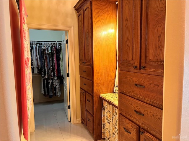 917 Beddoes Rd, La Feria, TX 78559 - corridor with light tile patterned flooring and baseboards
