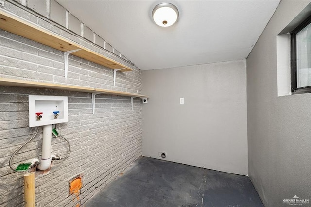 laundry area with hookup for a washing machine and hookup for an electric dryer