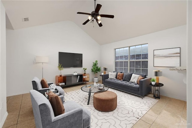 living room with ceiling fan, high vaulted ceiling, and light tile patterned floors