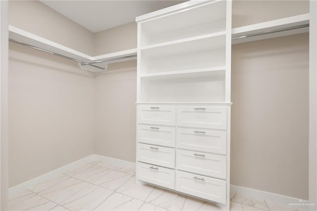 1008 Broken Arrow Dr, Alamo, TX 78516 - spacious closet featuring light marble finish floors
