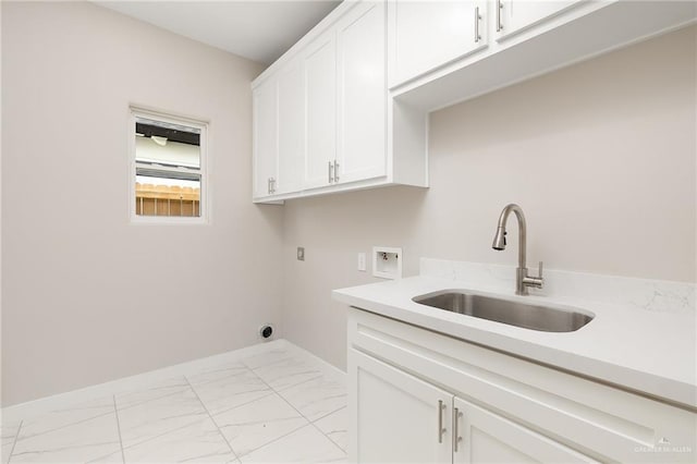 1008 Broken Arrow Dr, Alamo, TX 78516 - washroom with cabinet space, washer hookup, hookup for an electric dryer, and marble finish floors