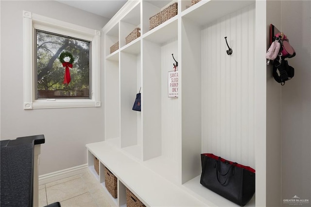 mudroom with light tile patterned floors