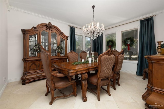 dining area featuring crown molding and an inviting chandelier