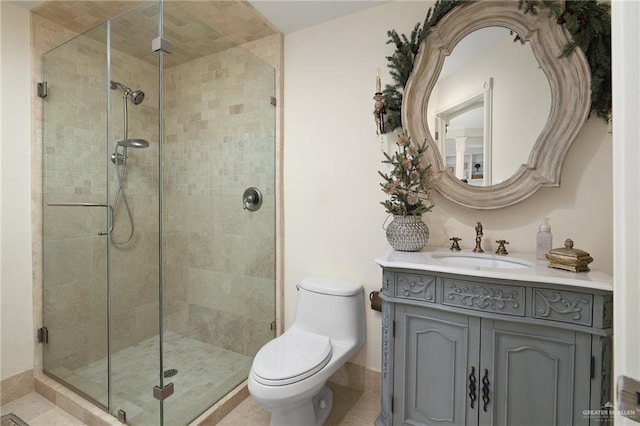 bathroom with vanity, toilet, and walk in shower