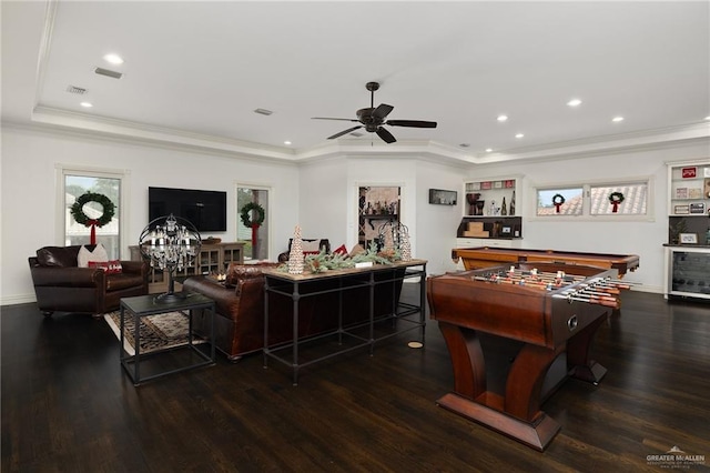 living room featuring ceiling fan, dark hardwood / wood-style flooring, ornamental molding, and billiards