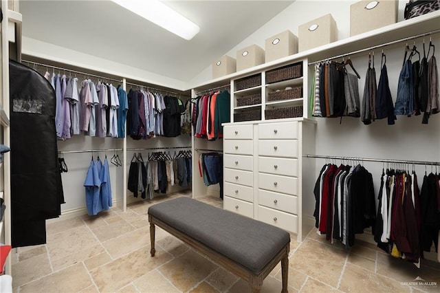 spacious closet featuring vaulted ceiling