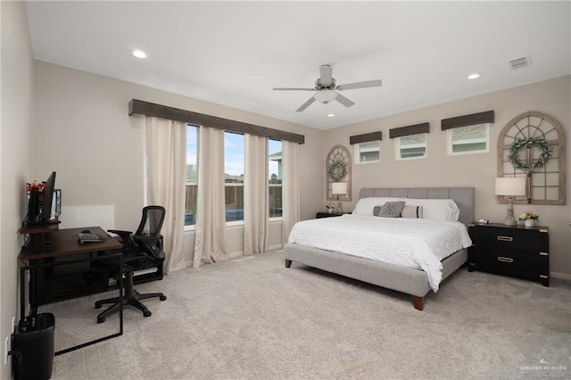 carpeted bedroom featuring ceiling fan