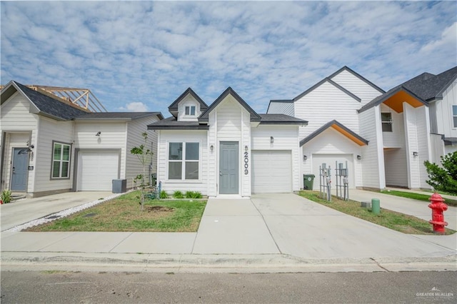 view of front facade with driveway and an attached garage