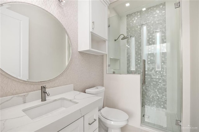 3505 Vendome Dr, Mcallen, TX 78504 - bathroom featuring vanity, a stall shower, and toilet