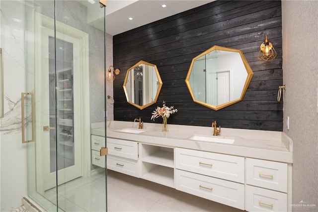 3505 Vendome Dr, Mcallen, TX 78504 - bathroom with tile patterned floors, double vanity, a stall shower, and wood walls