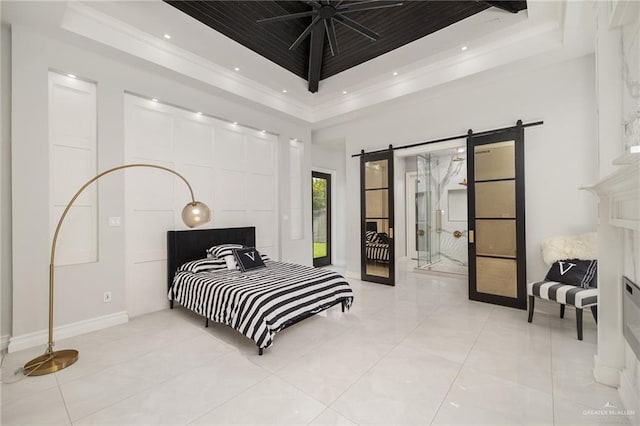 3505 Vendome Dr, Mcallen, TX 78504 - bedroom featuring a tray ceiling, a barn door, ornamental molding, light tile patterned floors, and baseboards
