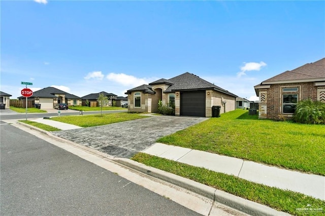 view of front of home featuring driveway, a garage, a residential view, and a front lawn