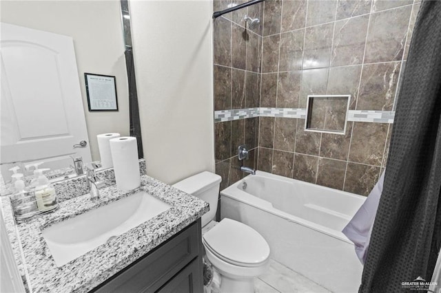 full bathroom with vanity, toilet, and shower / tub combo with curtain