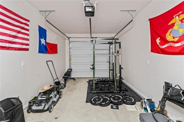 garage featuring baseboards and a garage door opener