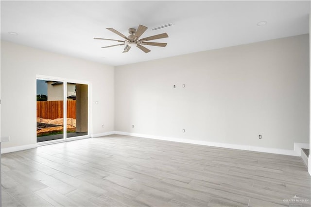 2609 E Solar Dr, Mission, TX 78574 - unfurnished room with ceiling fan, light wood finished floors, and baseboards