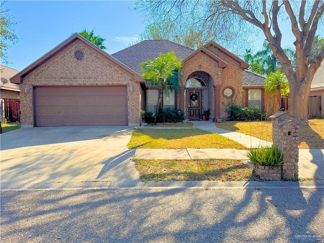 ranch-style home featuring a garage