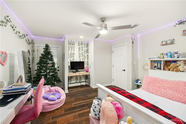 bedroom featuring ceiling fan and dark wood-type flooring