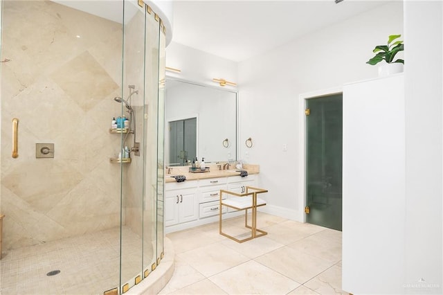 bathroom with tile patterned floors, vanity, and an enclosed shower