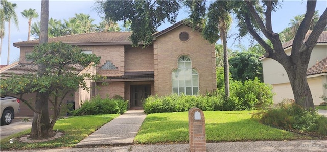 view of front of home with a front yard