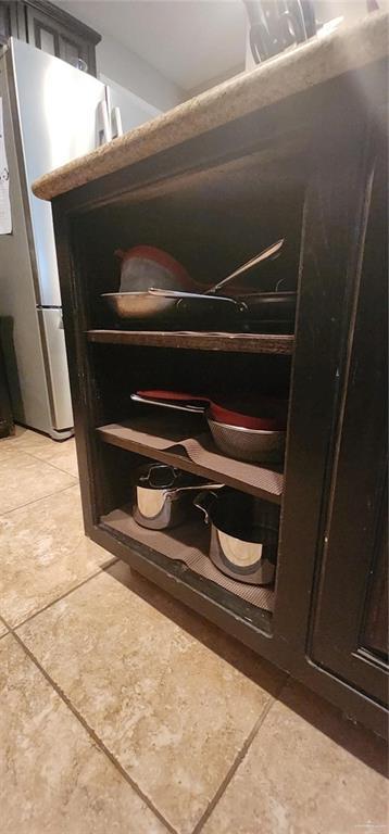 room details featuring stainless steel refrigerator