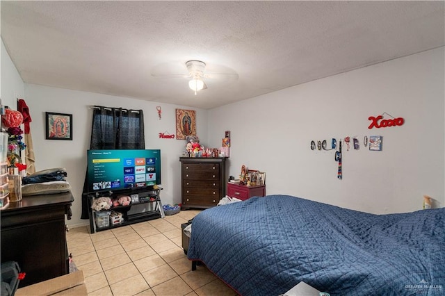 905 N 6th Ave, Edinburg, TX 78541 - bedroom with light tile patterned floors and a ceiling fan