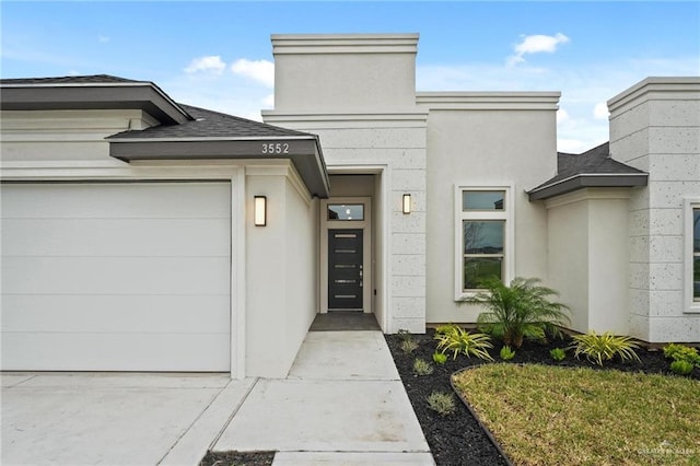 property entrance with a garage