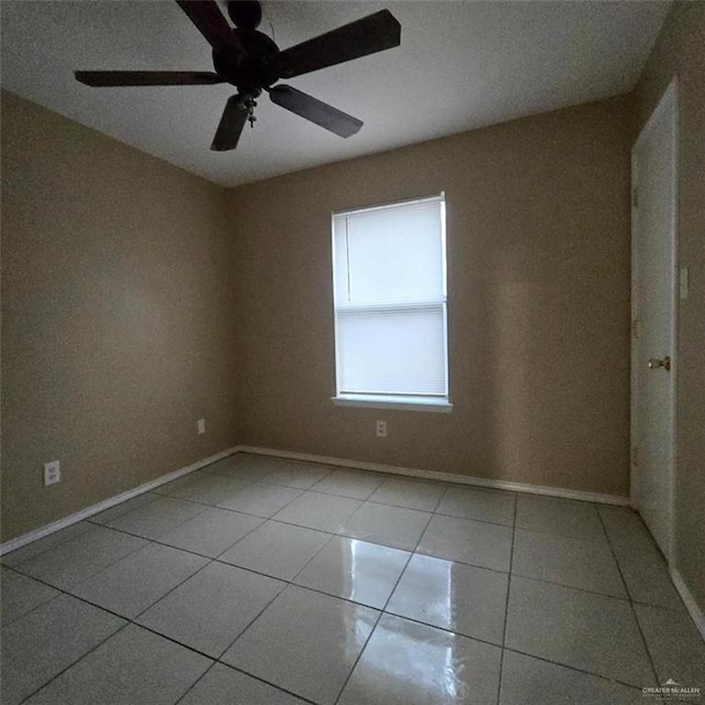 9218 N 29th Ln, Mcallen, TX 78504 - tiled empty room featuring baseboards and ceiling fan