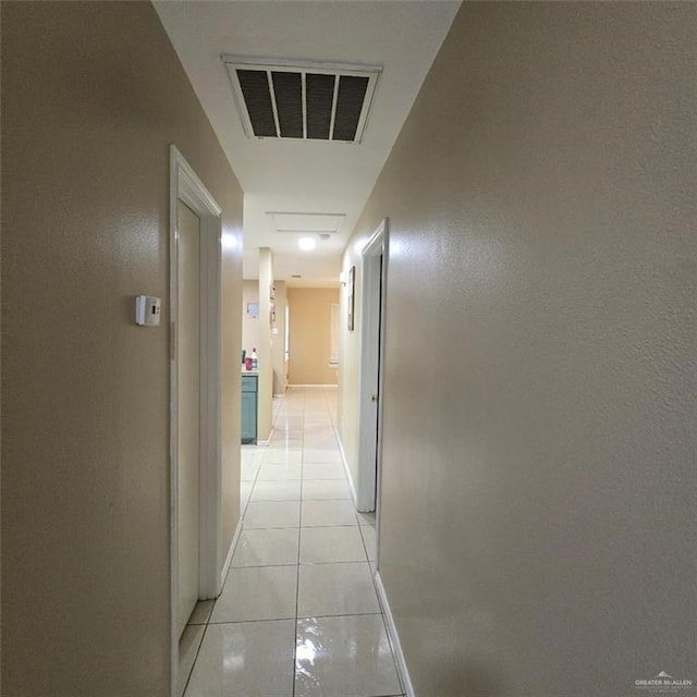9218 N 29th Ln, Mcallen, TX 78504 - corridor with visible vents, attic access, and light tile patterned floors