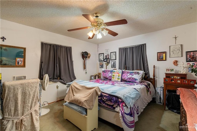 bedroom with carpet flooring, ceiling fan, and a textured ceiling