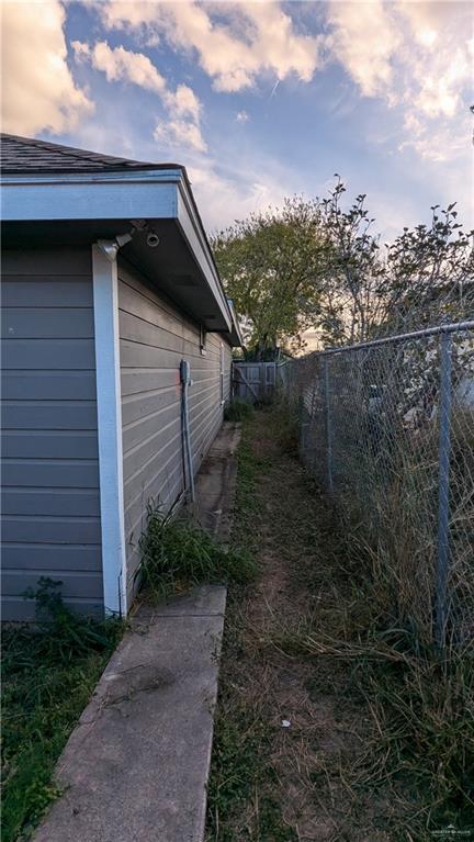 view of property exterior at dusk