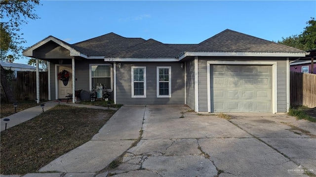 single story home featuring a garage