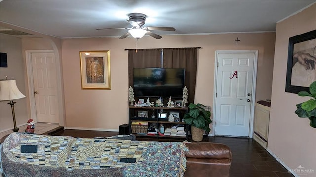 living room with ceiling fan and crown molding