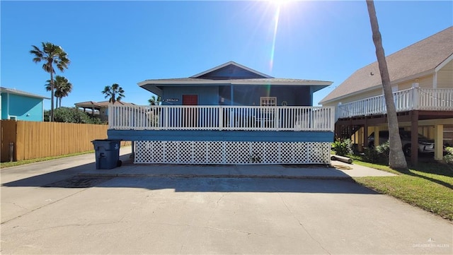 view of front of property featuring a wooden deck