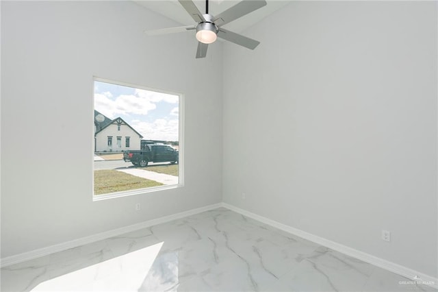 empty room featuring ceiling fan