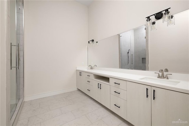 bathroom featuring walk in shower and vanity