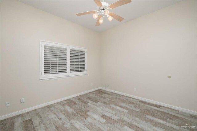 720 Cardinal Ave, Mcallen, TX 78504 - unfurnished room with baseboards, a ceiling fan, and wood finished floors