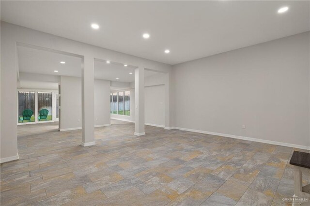 720 Cardinal Ave, Mcallen, TX 78504 - interior space with baseboards, stone tile flooring, and recessed lighting