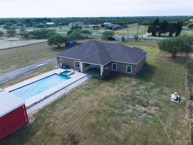 20985 Espinoza Rd, San Benito, TX 78586 - view from above of property featuring a pool area