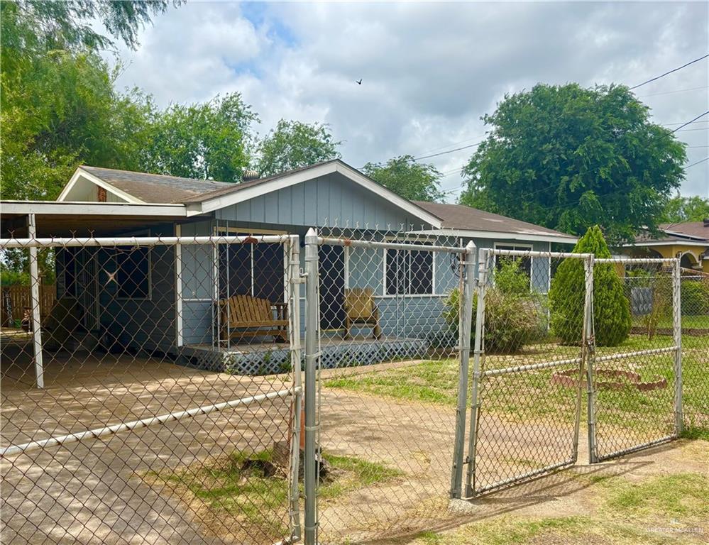 607 S Mile 1 Rd, Mission, TX 78572 - view of front of home featuring a gate