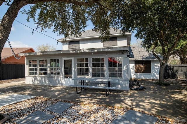 rear view of house featuring a patio